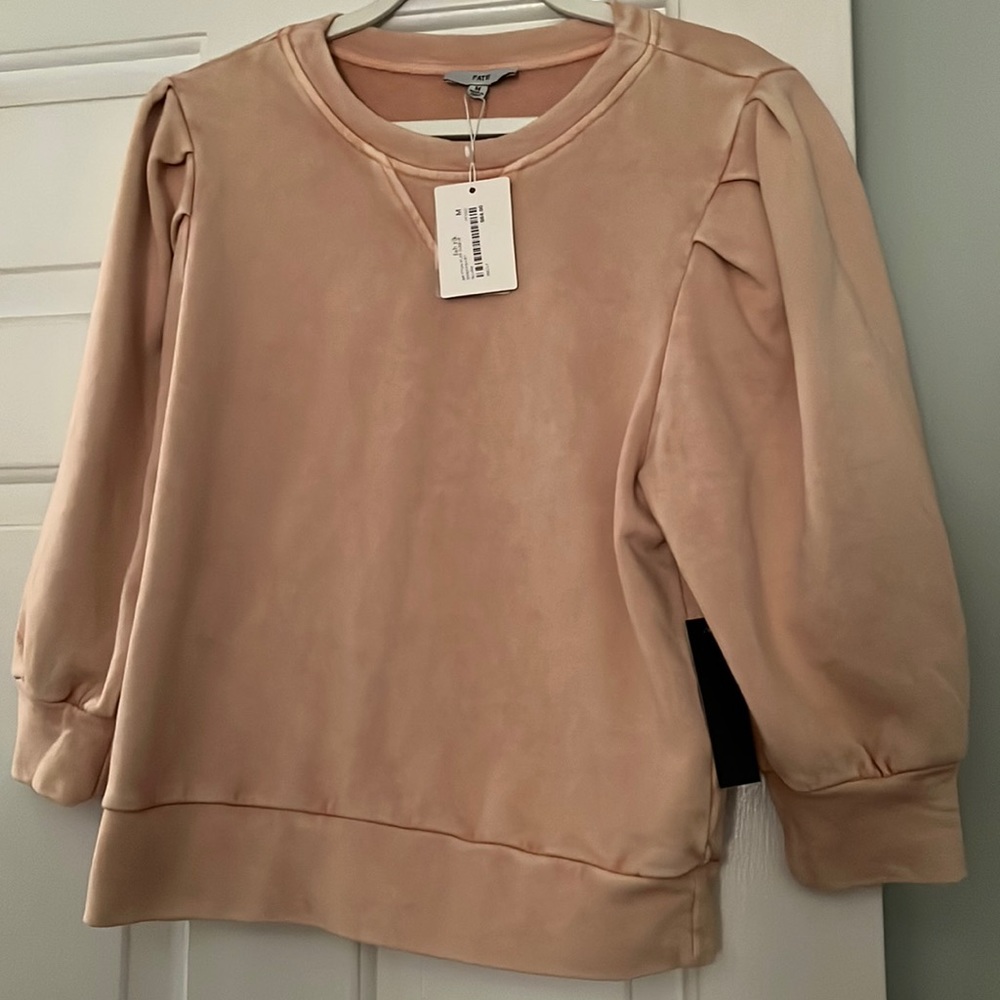 3 quarter length sweatshirt with puffy sleeves